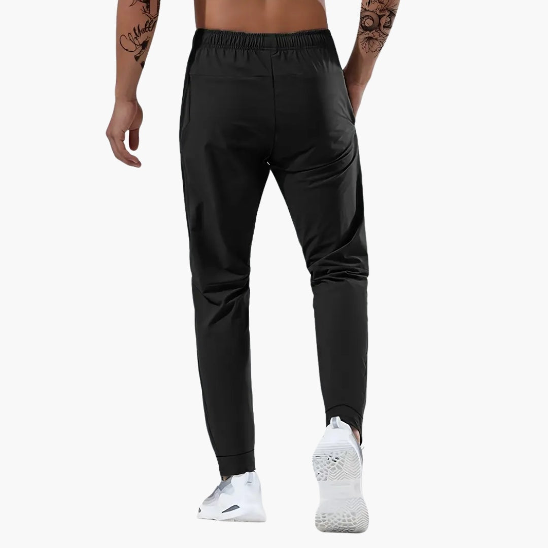 Adrián | Pantalón Deportivo Hombre Running Bolsillos Cremallera