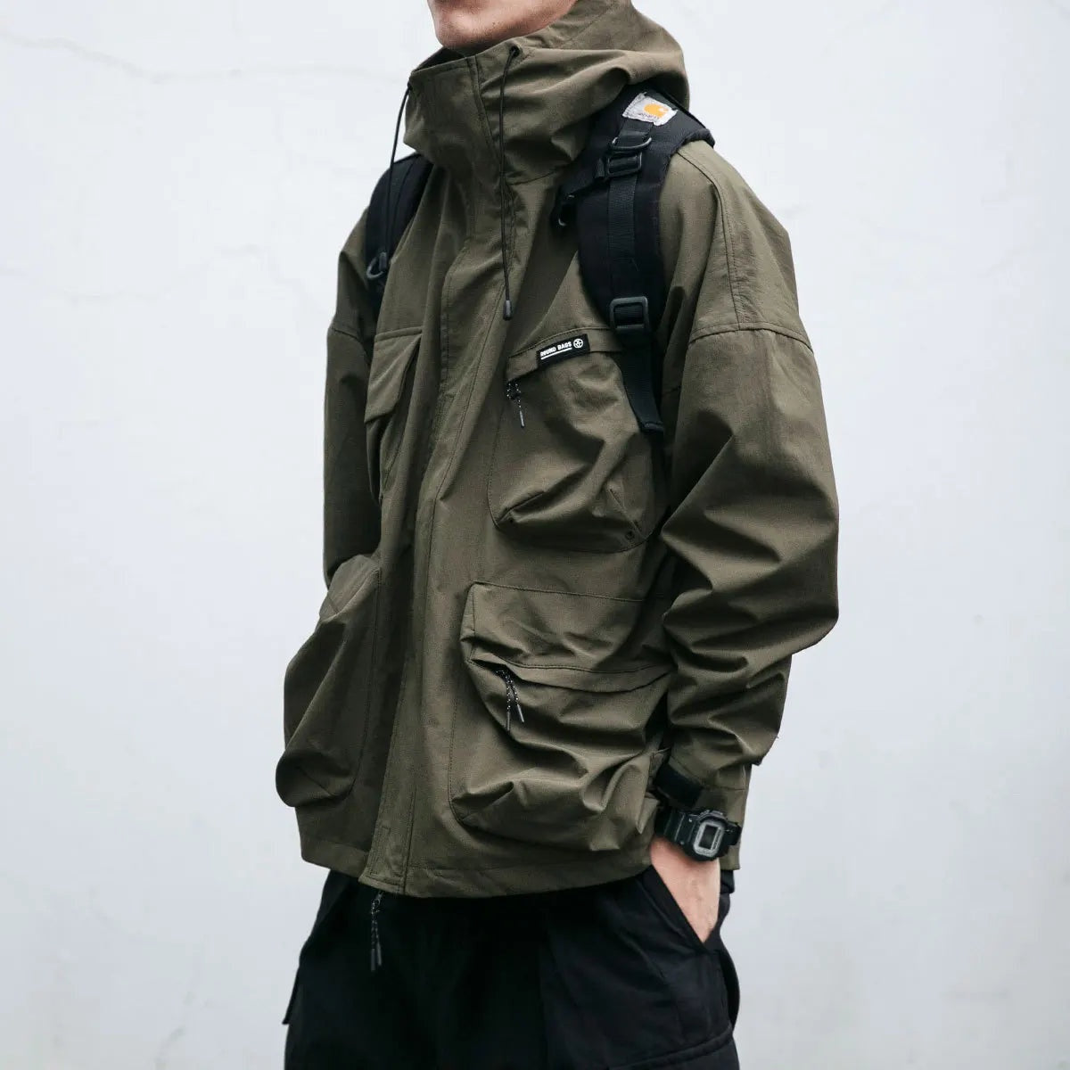 Darío | Chubasquero Hombre Impermeable con Capucha Múltiples Bolsillos