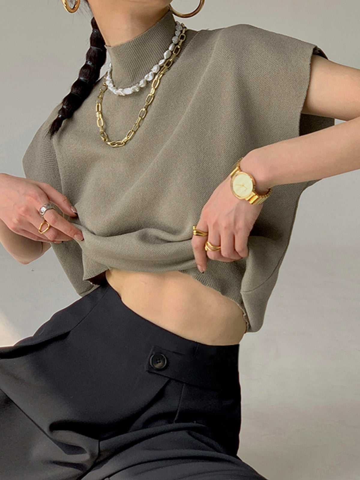 Top de Cuello Alto con Hombreras Mujer Sin Mangas
