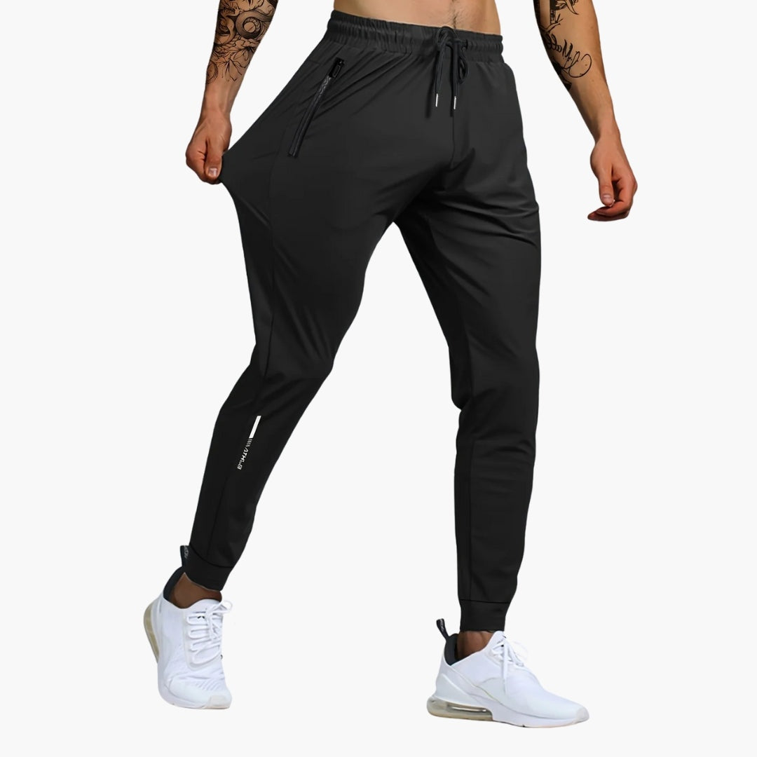 Adrián | Pantalón Deportivo Hombre Running Bolsillos Cremallera