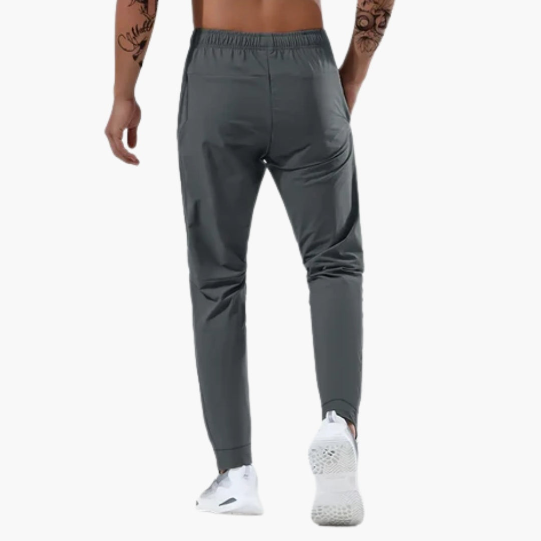 Adrián | Pantalón Deportivo Hombre Running Bolsillos Cremallera