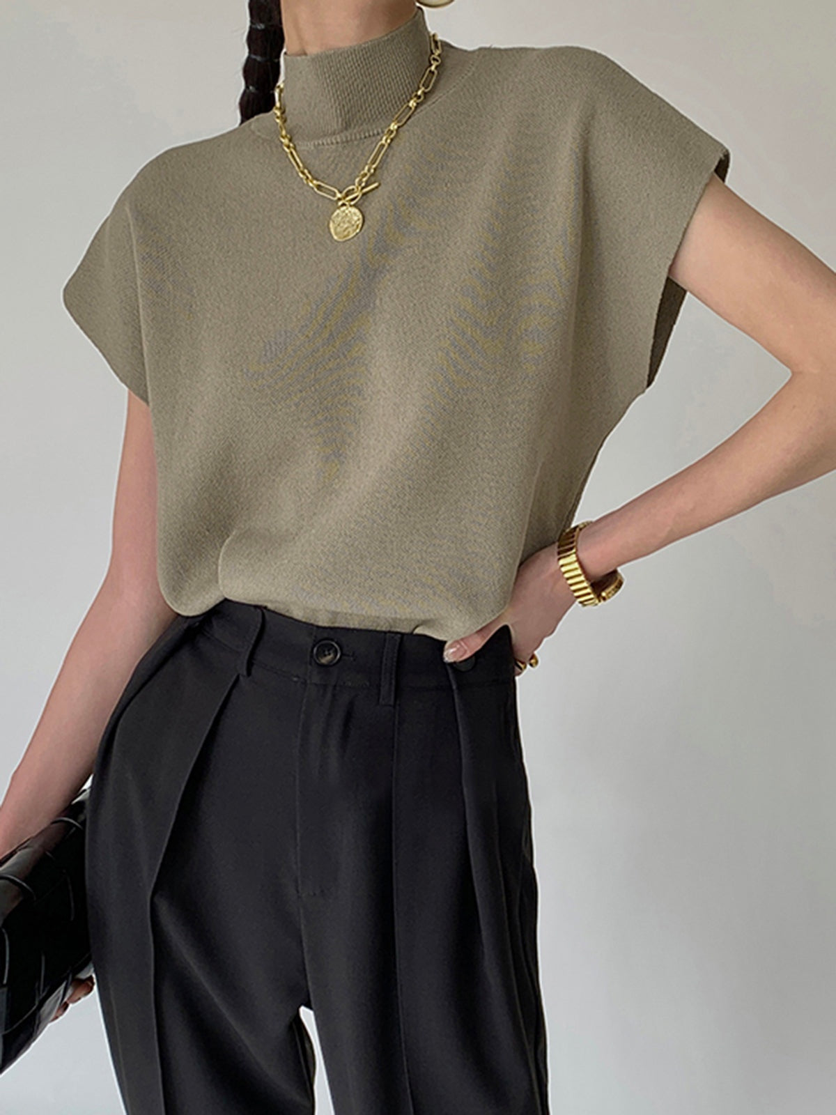 Top de Cuello Alto con Hombreras Mujer Sin Mangas